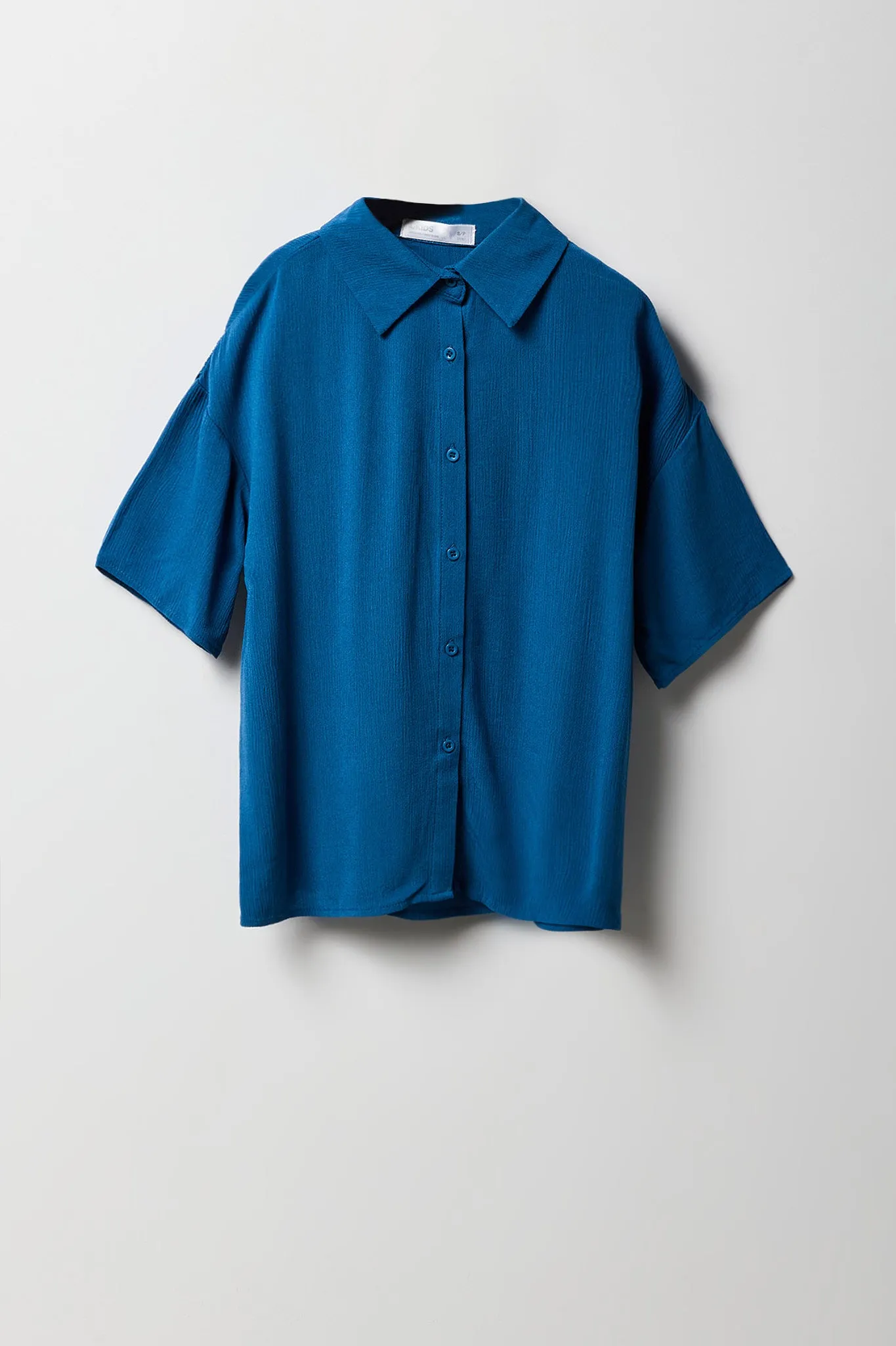 Ensemble avec haut boutonné froissé et short pour fille