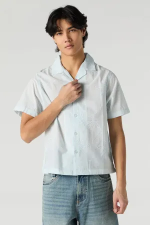 Haut boutonné avec motif de feuille brodé et oeillets