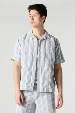 Haut boutonné en tricot rayé