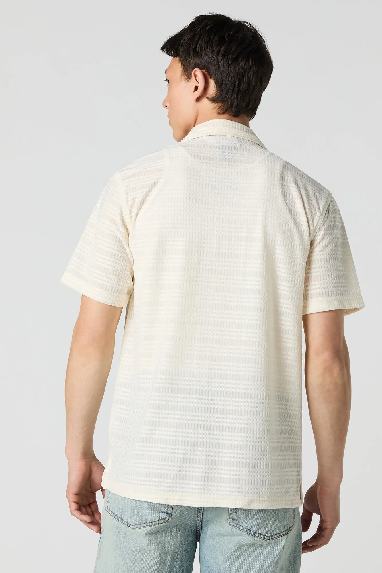 Haut boutonné texturé avec col