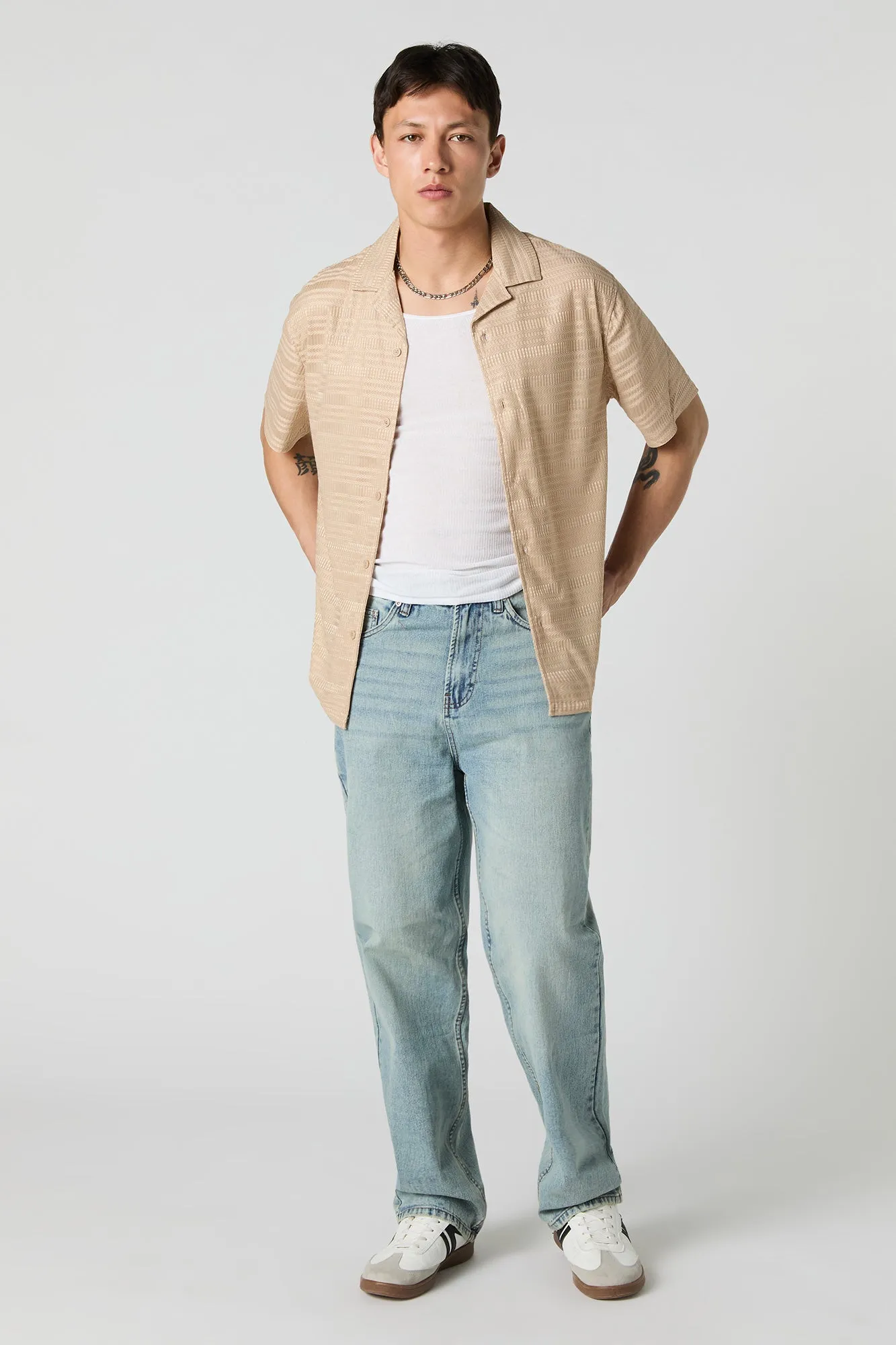 Haut boutonné texturé avec col