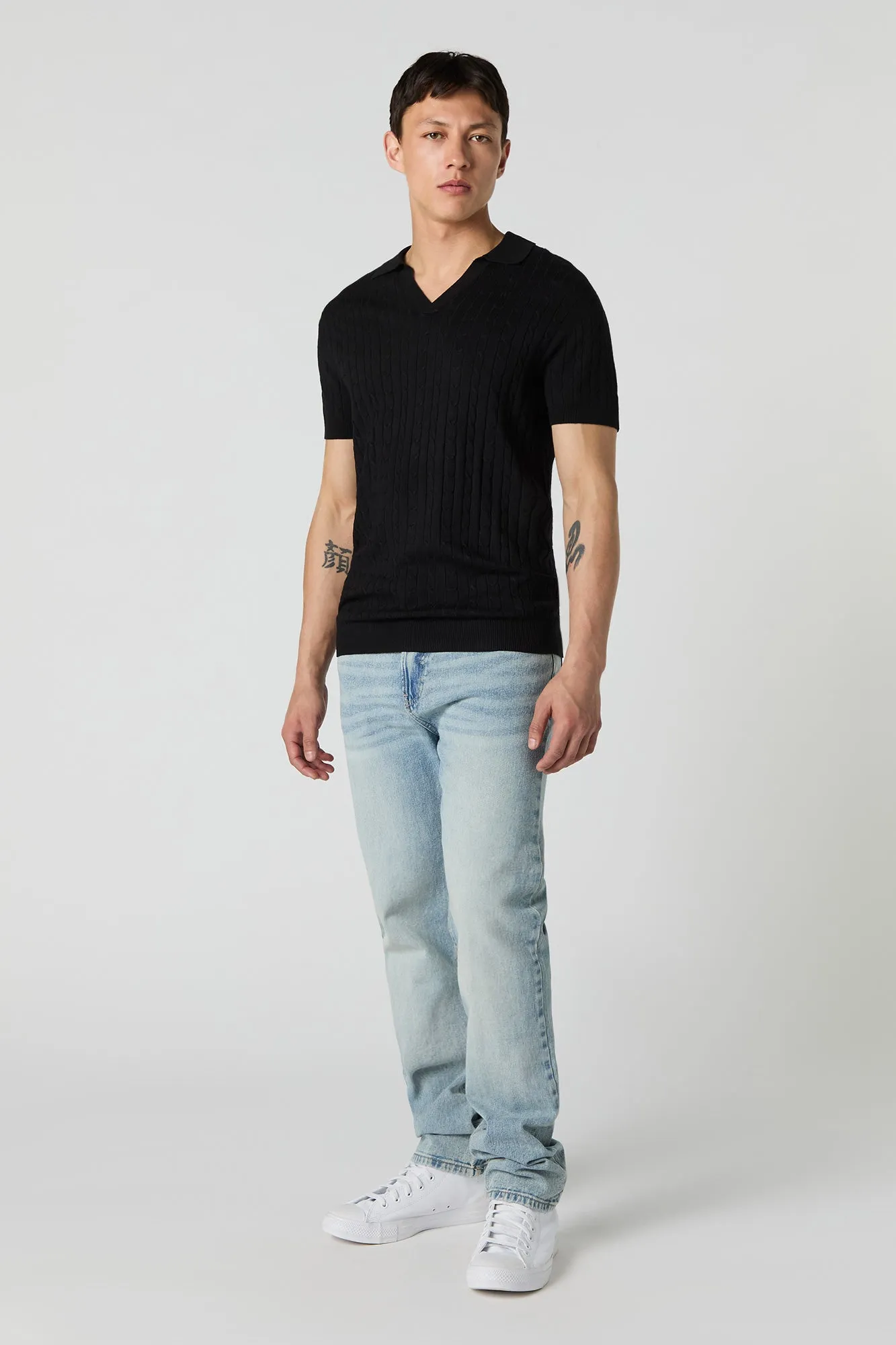 Haut en tricot torsadé avec col et encolure en V
