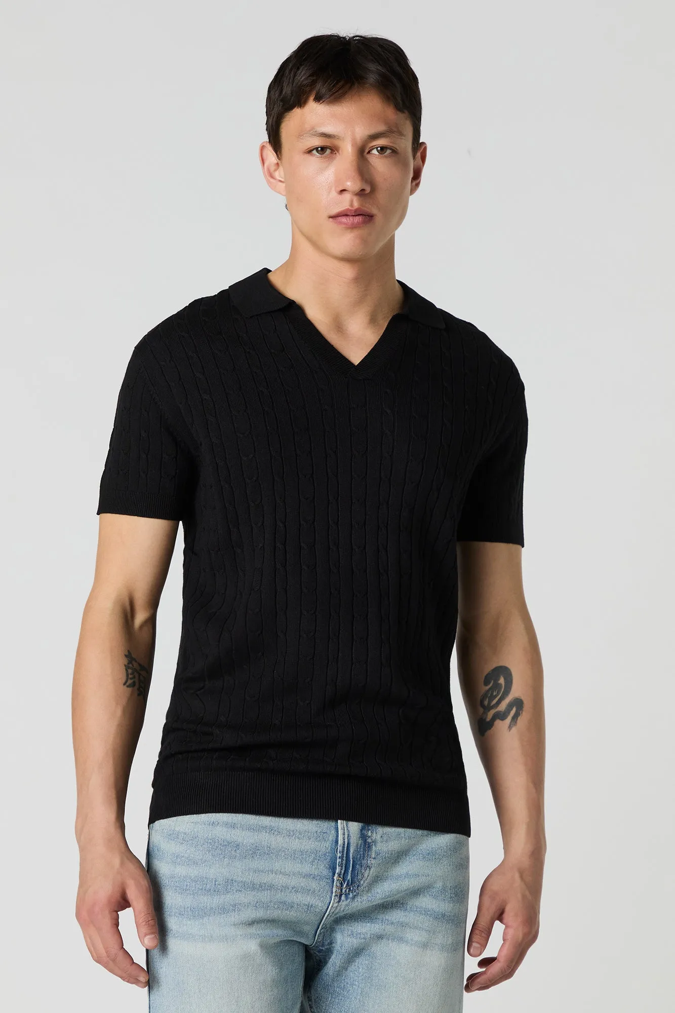 Haut en tricot torsadé avec col et encolure en V
