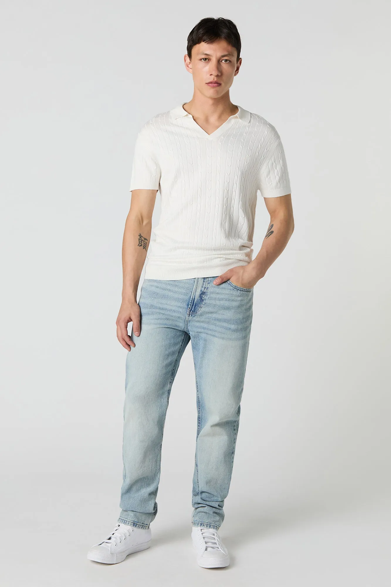 Haut en tricot torsadé avec col et encolure en V